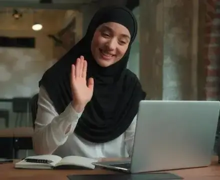 A woman waving